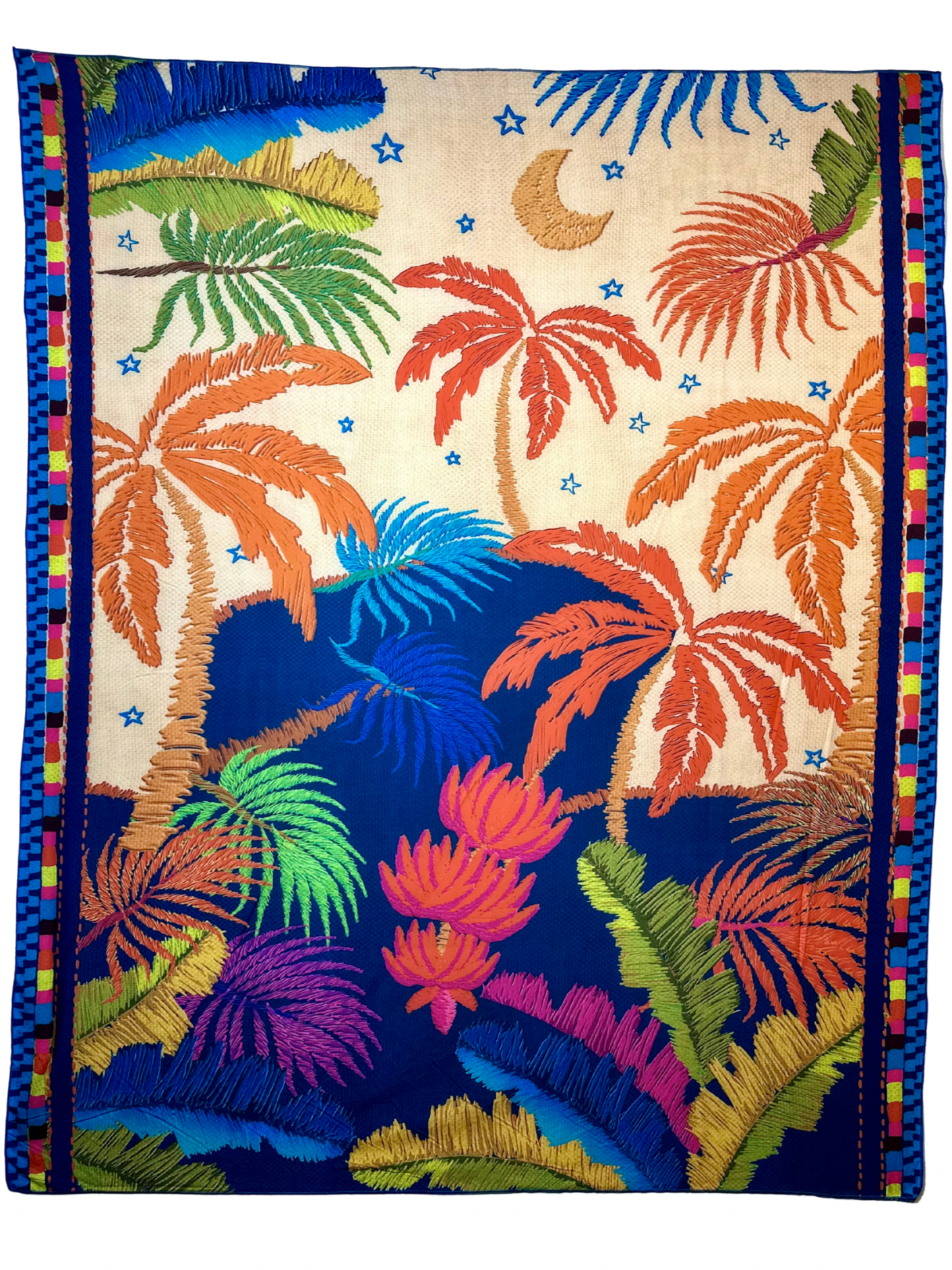 Colorful tropical patterned fabric with palm trees and flowers on a white background