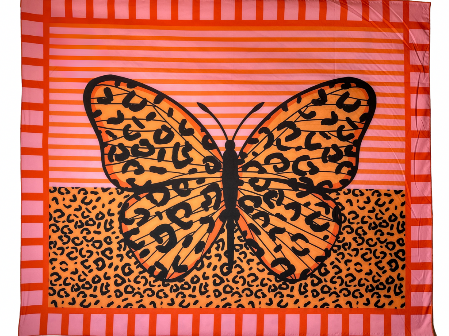 Butterfly with leopard print on a red and pink striped background